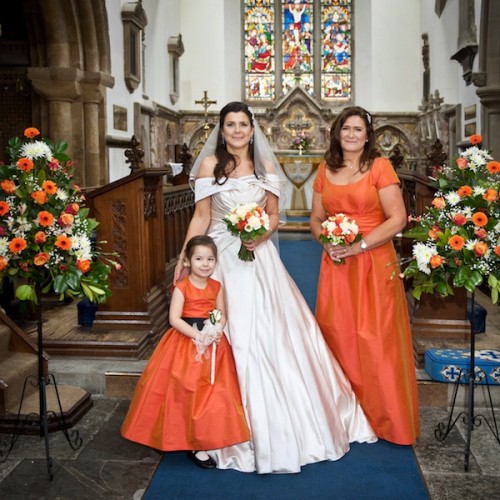 real Dessy bridesmaids in tangerine