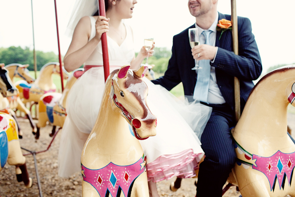 bride and groom on roundabout
