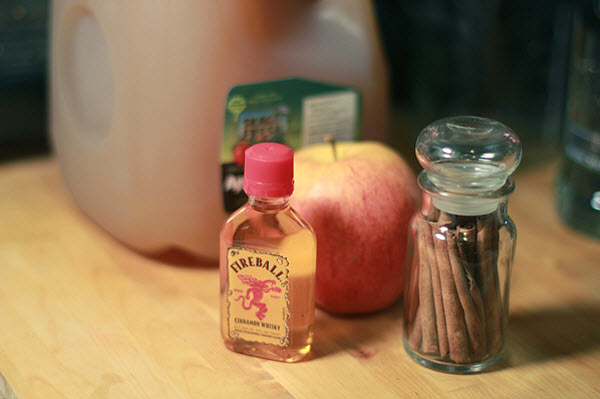Hot Apple Cider Cocktail served in an Apple